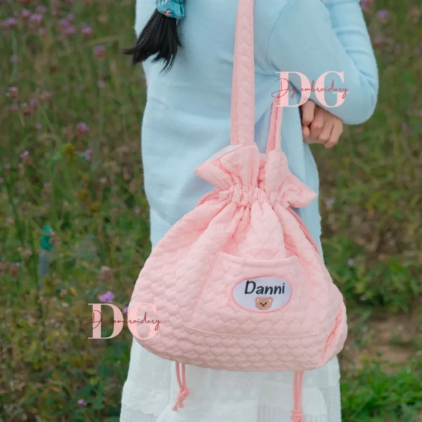 Personalized embroidered quilted bag enchanted by rare adorable beauty, featuring a cute drawstring pouch design as a unique accessory for personalized birthday gifts. Personalized embroidered quilted bag enchanted by rare adorable beauty, featuring a cute drawstring pouch design as a unique accessory for personalized birthday gifts.