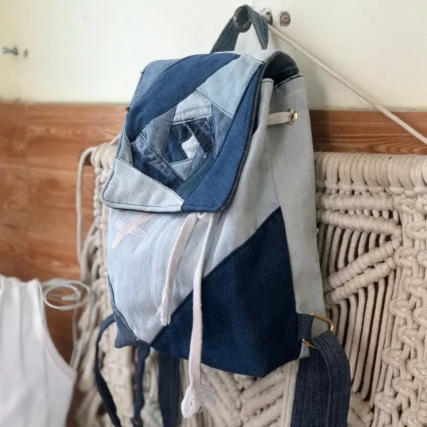 Floral flap backpack from old jeans adds an elegant fashion statement touch, creating a one-of-a-kind upcycled accessory and unique handcrafted birthday gift.Floral flap backpack from old jeans adds an elegant fashion statement touch, creating a one-of-a-kind upcycled accessory and unique handcrafted birthday gift. Floral flap backpack from old jeans adds an elegant fashion statement touch, creating a one-of-a-kind upcycled accessory and unique handcrafted birthday gift.Floral flap backpack from old jeans adds an elegant fashion statement touch, creating a one-of-a-kind upcycled accessory and unique handcrafted birthday gift.