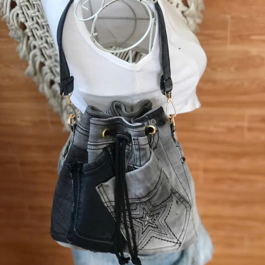 Gray tie-dye bucket bag from old jeans offers unique color palette for your style, creating an upcycled jeans accessory as impressive birthday gift and handcrafted gift. Gray tie-dye bucket bag from old jeans offers unique color palette for your style, creating an upcycled jeans accessory as impressive birthday gift and handcrafted gift.