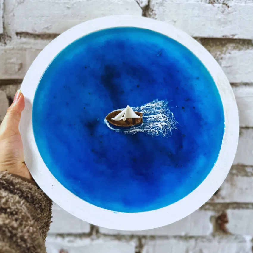 "Smooth Sailing" epoxy resin art with 30cm round frame serves as a meaningful artistic gift, featuring handcrafted 3D ocean painting wall art as a unique housewarming gift. "Smooth Sailing" epoxy resin art with 30cm round frame serves as a meaningful artistic gift, featuring handcrafted 3D ocean painting wall art as a unique housewarming gift.