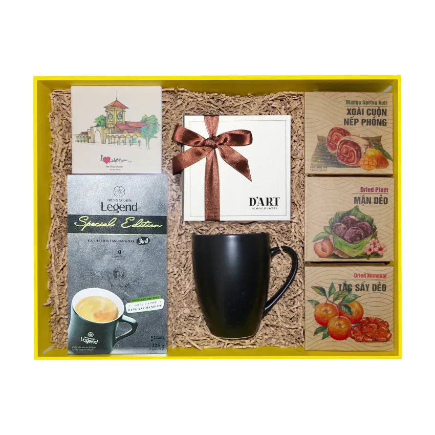 The "Viet Heritage" gift box captures the essence of Vietnam with coffee, elegant cups, and dried fruits – a premium specialty gift for corporate occasions.