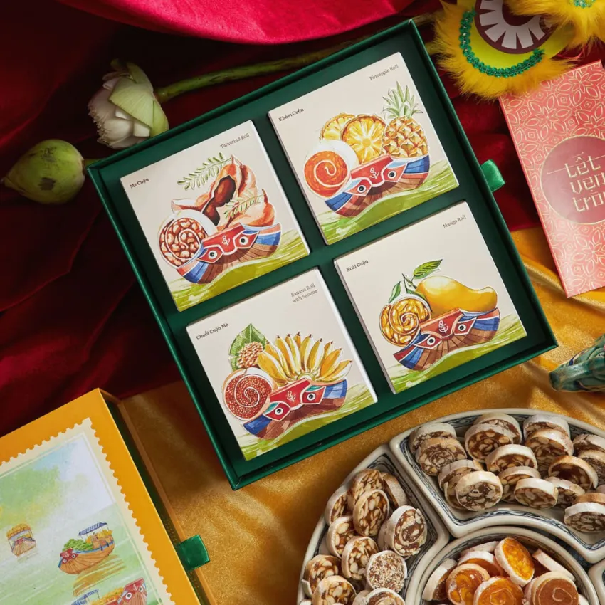 "Mango Harmony" gift box captures the essence of Vietnamese mango with a 4-flavor mango roll set, beautifully packaged as a perfect snack gift or Vietnam souvenir. "Mango Harmony" gift box captures the essence of Vietnamese mango with a 4-flavor mango roll set, beautifully packaged as a perfect snack gift or Vietnam souvenir.