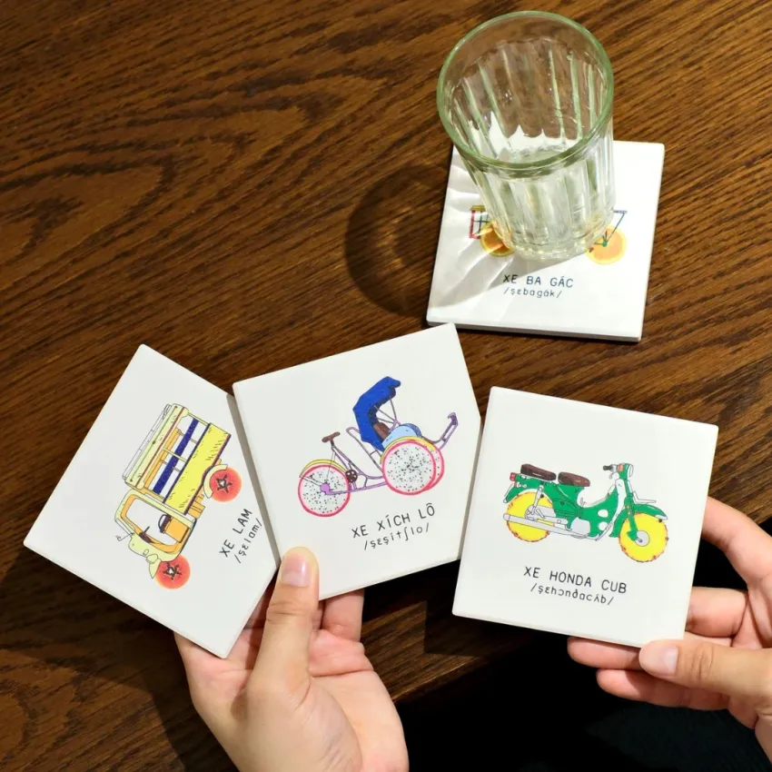 Vietnam cultural coaster set of 4 with wooden base, quick-absorbing and ideal as a compact and meaningful souvenir gift.