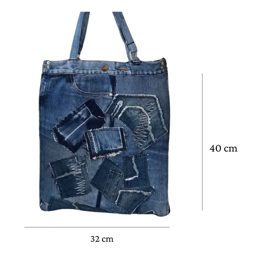Slim bottom tote crafted from old jeans creates an exclusively yours accessory, combining upcycled materials with fashion-forward design as sustainable fashion statement and meaningful eco-friendly handmade gift Slim bottom tote crafted from old jeans creates an exclusively yours accessory, combining upcycled materials with fashion-forward design as sustainable fashion statement and meaningful eco-friendly handmade gift